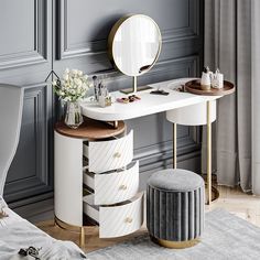 a dressing table with drawers, stool and mirror