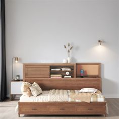 a bed sitting in the middle of a bedroom next to a wall mounted book shelf