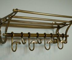 there is a metal rack with hooks on it