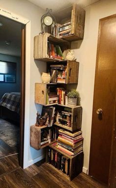 a bookshelf filled with lots of books next to a door