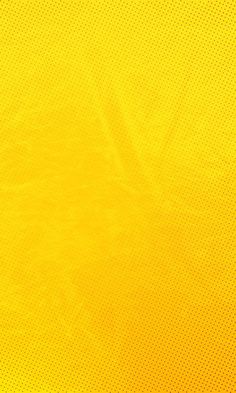 an abstract yellow background with dots