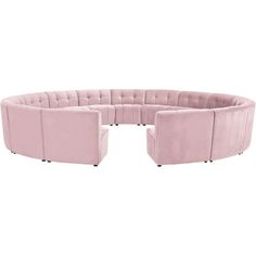 a pink sectional couch with four seats