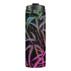 thermos flask is decorated with purple and green fern leaves on a black background