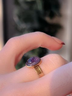 An extremely rare Victorian scarab conversion ring with a sensual pink/orchid foil beneath her delicately carved body. Once a stickpin, now a ring, this outstanding conversion has been fitted on a casting of a Victorian striped band. This particular ring is in excellent condition and is perfect for stacking or solo wear. Marks: 14k Age/Origin: Victorian scarab, later band, American Weight: 1.75g Size: 5.5 Materials: 14k, Carved Amethyst Scarab, foil Condition: Very good conversion condition. 2024 Energy, Antique Amethyst Ring, Egyptian Revival Jewelry, Amethyst Ring Vintage, Golden Rings, Bling Ring, Egyptian Revival, Homescreen Layout, Golden Ring