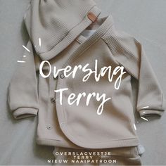 a baby's sweater and pants with the words oversnag ferry on it