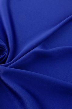 "Fabric Content: 100% Polyester Fabric Description: Heavy Weight Japanese Style Crepe Satin is a luxurious and beautifully manufactured Satin. One of a kind, Crepe Background and Crepe Satin texture. One Side Shiny, one side dull. Both sides face depending on your usage and needs. Great for dresses, art work, tablecloths, linens, napkins, overlays and more Is this a Sheer or Solid Fabric? : This Fabric is Solid Fabric Width: 60\" Wide Please be advised all custom made finished products with our Luxury Blue Fabric For Formal Occasions, Silk Fabric Wallpaper Blue, Silk Fabric Blue, Blue Embroidered Silk Fabric, Crepe Fabric Blue, Dresses Art, Satin Texture, Blue Satin, Fabric Width