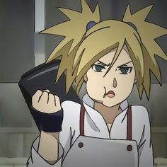 an anime character with blonde hair holding a cell phone in one hand and looking at the camera