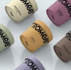 six different colors of coffee cups with the word rome printed on them, all in black and white