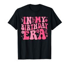 a black shirt with pink lettering that says in my birthday era