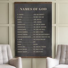 two chairs in front of a blackboard with names of god