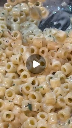 macaroni and cheese being cooked in a pan