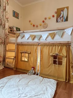 there is a bunk bed with curtains on the top and below it, next to a window