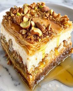 a piece of cake with nuts on top