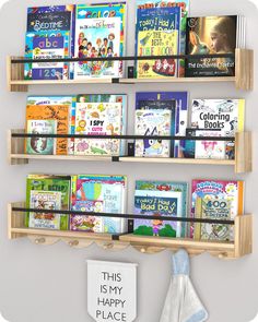 there are many books on the shelves in this children's bookcases display