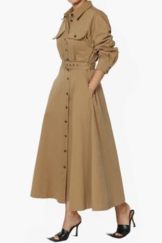 Elevate your wardrobe with this versatile Long Sleeve Maxi Trench Shirt Dress, perfect for business casual to wedding guest attire.Crafted from a cotton twill, it features a modern point collar, button-down front, and a flattering belted waist.The A-line skirt with dual patch chest pockets and side slit pockets adds practicality, while the relaxed sleeves and ankle length maintain a timeless elegance.Ideal for spring through fall, it's machine washable for easy care. Pair with ankle boots or str Button Down Dress Outfit, Wedding Guest Attire, Chic Wardrobe, Trench Dress, Button Down Shirt Dress, Maxi Shirts, Guest Attire, Wardrobe Update, Wedding Attire Guest