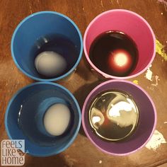 three bowls with eggs in them sitting on a table