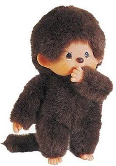 a small stuffed animal is wearing a bear suit and holding its hand to his mouth