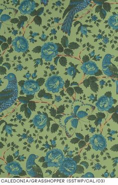 a blue and green wallpaper with birds on it