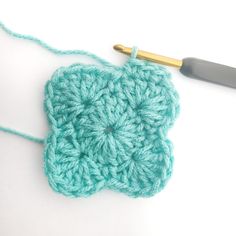 the crochet square is being worked on