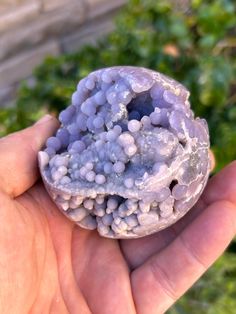 This is a really special sphere with nice size "Grapes", excellent color and size, sparkle, and a druzy coating sprinkled across different areas of the agate. Grape Agate gemstone is a relatively new find. Although the trade name is Grape Agate, these are actually Botryoidal Purple Chalcedony found only in the  Mamuju area of the western Sulawesi coast of Indonesia. These beautiful hand polished Sphere's come directly from the source. This particular sphere measures 7cm. We will include an acrylic stand with the sphere. *  Please make sure to look at all photos before purchasing. *  If you would like additional photos, please send us a message. *  If you have any additional questions, please message us. *  All the items will be shipped out to you usually in 1-2 days, however sometimes we a