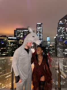 Picture of a couple celebrating Halloween wearing a gray donkey costume and a red dragon costume with wings from the movie shrek Halloween For 2 People, Donkey Dragon Costume, Donkey And Dragon Couple Costume, Shrek And Donkey Costume, Donkey And Dragon Costume, Dragon And Donkey, Shrek Dragon Costume, Couples Costumes 2024, Cute Halloween Costumes For Couples