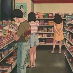 three people standing in a grocery store looking at items on the shelves and one person is reading