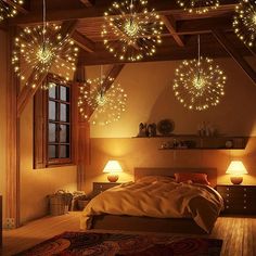 a bedroom with lights hanging from the ceiling