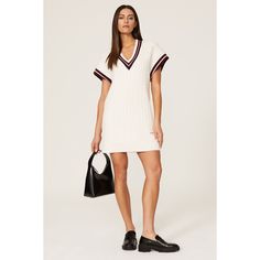 White knit (45% Nylon, 30% Cotton, 25% Wool). Shift. V-neck. Short sleeves. Pull-on. 33" from shoulder to hemline. Imported. White V-neck Sweater Dress For Fall, Ribbed V-neck Sweater Dress For Spring, Casual V-neck Sweater Dress For Spring, Knit V-neck Mini Dress For Day Out, V-neck Ribbed Sweater Dress For Work, White V-neck Mini Dress For Fall, Casual V-neck Ribbed Sweater Dress, White Ribbed V-neck Mini Dress, Casual Ribbed V-neck Sweater Dress