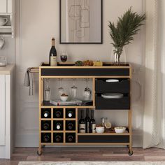 a bar cart with wine glasses, plates and bottles on it next to a potted plant