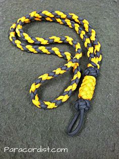 a yellow and black rope on the ground