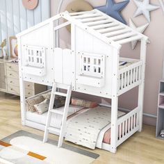 there is a white bunk bed with stairs