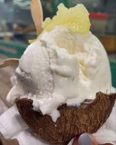 an ice cream sundae in a coconut shell