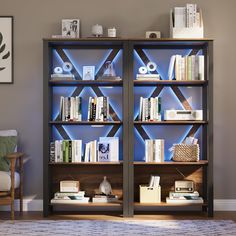 a bookshelf filled with lots of books next to a chair