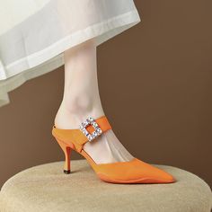 Elegant and stylish mules that offer you an effortless chic look. Upper: Genuine Leather Lining: Genuine Leather Outsole: Rubber Toe Shape: Pointy Toe Heel: 6.5cm/2.5'' Closure: Slip on Fashion Element: Square Rhinestone Decoration is_handmade: Yes Party Slip-on Mules With Heel Loop, Elegant Summer Slip-on Kitten Heels, Casual Heels With Pointed Toe And Heel Loop, Casual Slip-on Mules For Party, Casual Heels With Heel Loop And Pointed Toe, Elegant Slip-on Kitten Heels For Spring, Elegant Spring Slip-on Kitten Heels, Chic Slip-on Kitten Heels For Party, Trendy High Heel Mules With Buckle Closure