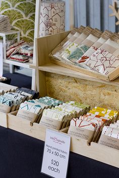 a display in a store filled with lots of different types of cards and envelopes