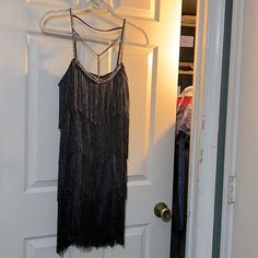 Nwt $400 Free People | Fringe Flapper Dress In Charcoal Gray Shake & Shimmy In This Fun Dress Sheer (See Close Up W/Hand Under) Body But Covered Well With Varying Length Fringe In Tiers Charcoal Gray (Grey) But Sometimes Appears Brown - A Pretty, Earthy Brown Embellishment Around Collar & Straps That Sparkles In Light Some Very Slight Piling - Though New - On Underside (See Close Up Near Brand Label) Truly Delightful & Super Cool Reasonable Offers Welcome. Disturbingly Low Offers (Consider Condi Charcoal Gray Dress, Fringe Flapper Dress, Wrap Front Dress, Sleeveless Sweater Dress, Free People Maxi Dress, Free People Mini Dress, Lace Sleeveless Top, Earthy Brown, Fun Dress