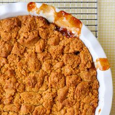 a close up of a pie on a cooling rack