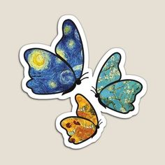 three stickers with different designs of butterflies in blue, yellow and orange colors on them