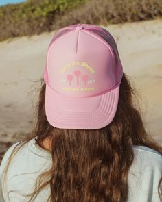 Our new Living the Dream Trucker Hat is available in three vibrant colors—light pink, seafoam, and brown—perfect for adding a pop of color to your adventures. Designed with a breathable mesh back and an adjustable strap, this hat guarantees a comfortable fit for all head sizes. Product Details Unisex One Size Fits All Adjustable Strap Made with Love Pink Sun Hat For Beach Travel, Summer Mesh Trucker Hat With Curved Brim, Pink Summer Hats For Travel, Pink Summer Hat For Travel, Pink Summer Travel Hat, Spring Outdoor Trucker Snapback Hat, Spring Snapback Trucker Hat For Outdoor Activities, Pink Beach Hats For Travel, Summer Lightweight Visor Trucker Hat