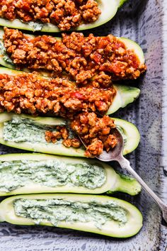 stuffed zucchini boats filled with meat and sauce