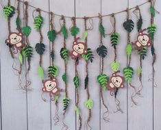 monkey themed garland with green leaves and vines