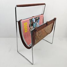 a magazine rack with magazines in it