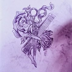 a drawing of scissors and roses on paper