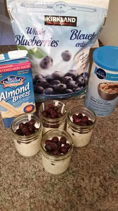 the ingredients for blueberry cheesecakes are on the counter