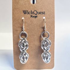 the earrings are made out of metal and have two loops on each earwires