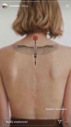 the back of a woman's body with an image of a bird on it