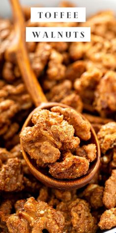 a wooden spoon filled with walnuts on top of a white plate and the words toffe walnuts above it