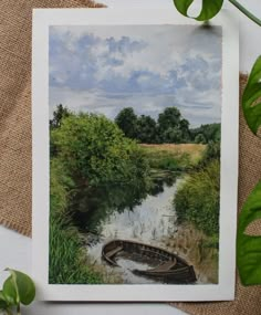 a painting of a boat in the water next to a green leafy plant on a burlap surface