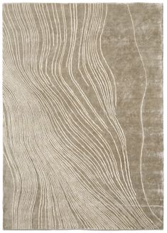 a beige rug with wavy lines on it