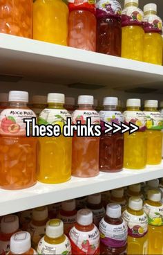 there are many different types of drinks on the shelves in this store that is filled with them